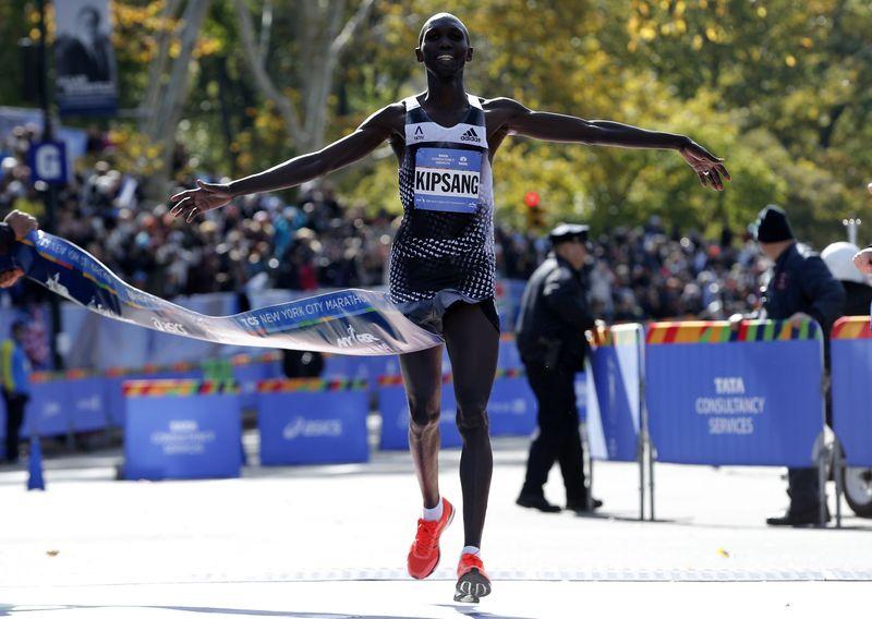 Kenya's former marathon world record holder arrested for breaking COVID ...